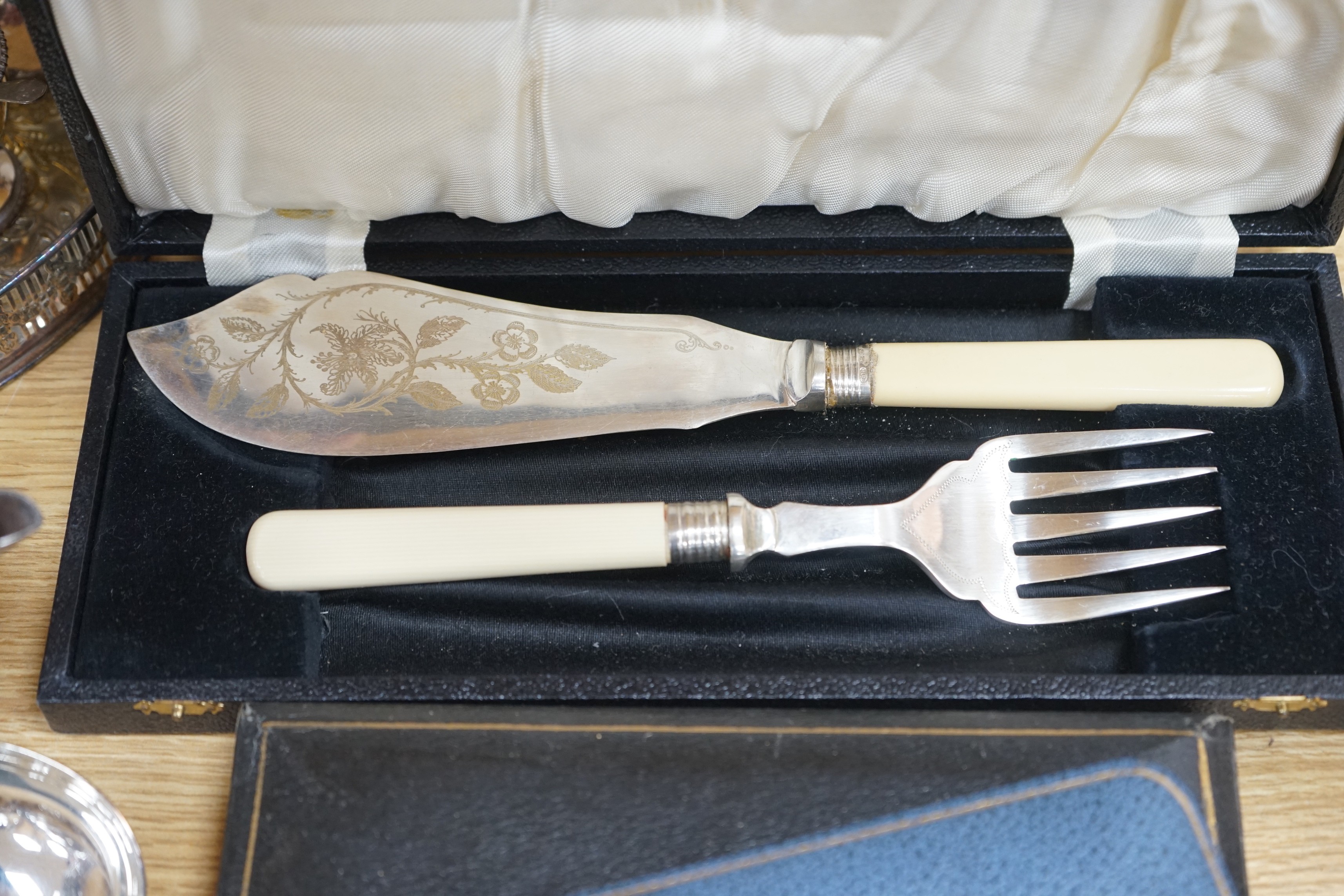 A quantity of silver plate including a cocktail shaker and a ewer